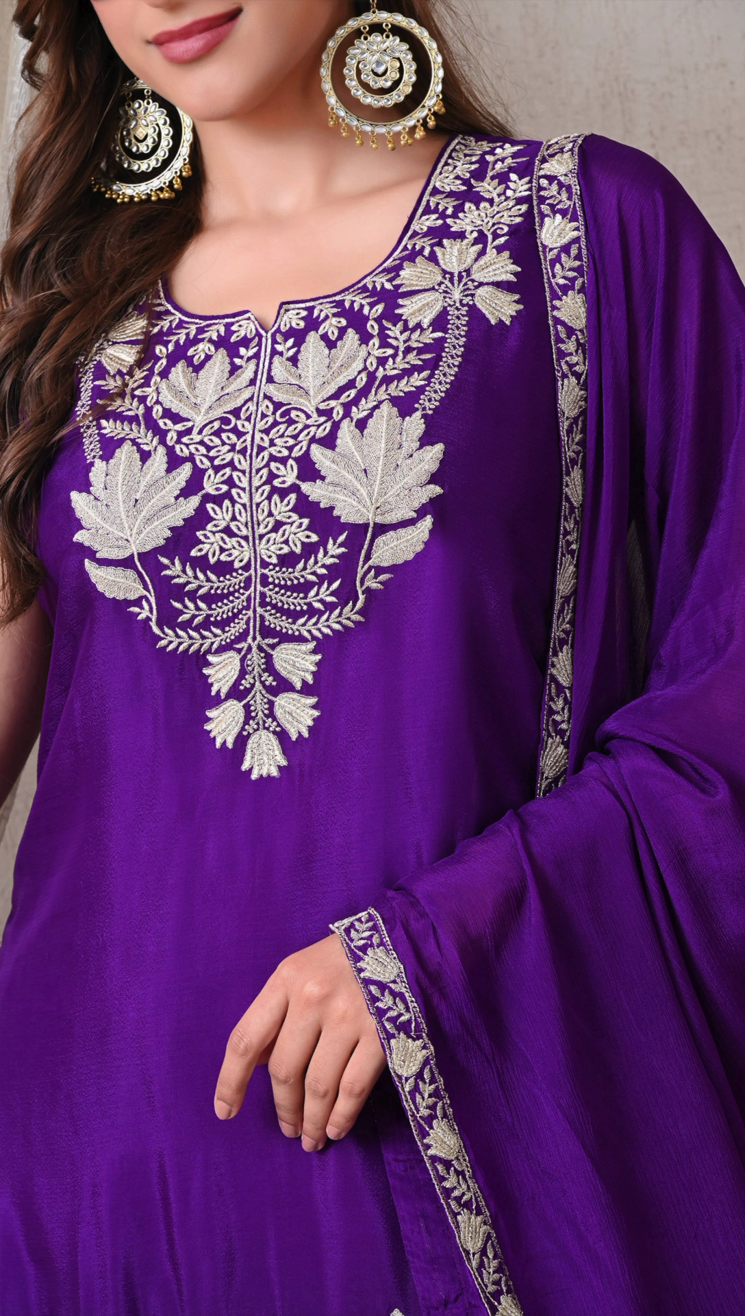 Closeup embroidery detailing on royal purple sharara suit