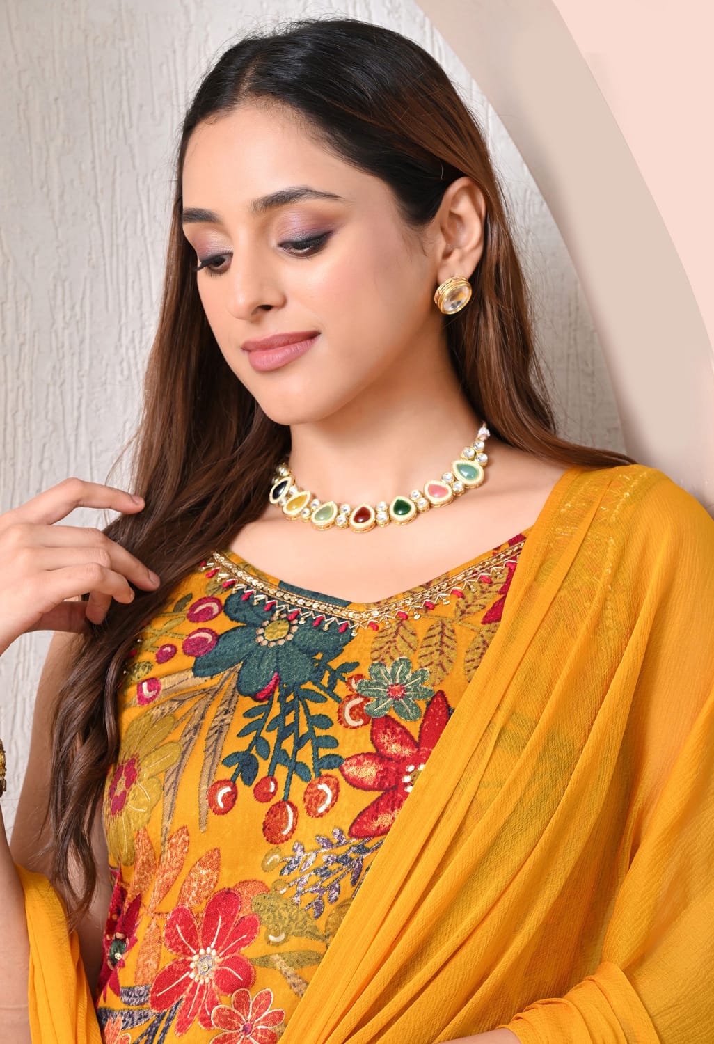 Closeup detail of mustard yellow floral print sharara suit