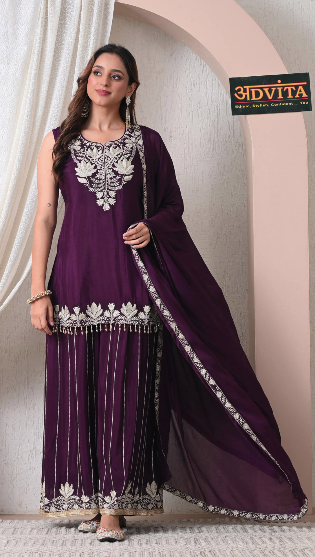 Side view of purple party wear sharara suit with dupatta