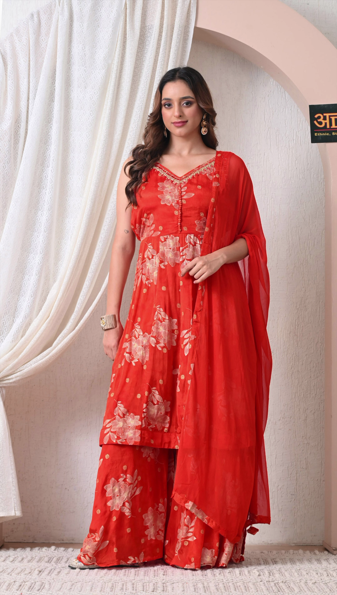 Full look of red floral party wear sharara suit for women