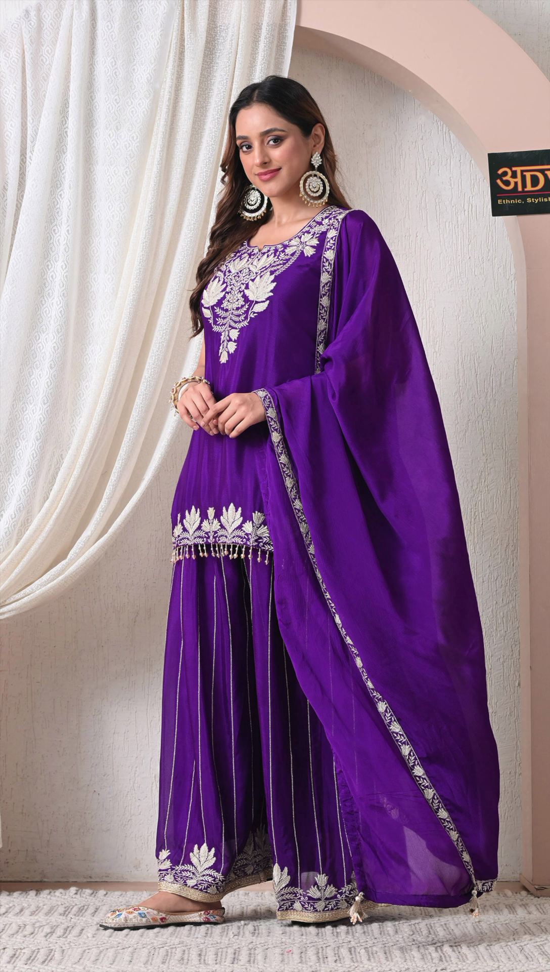 Side view of royal purple party wear sharara set for women