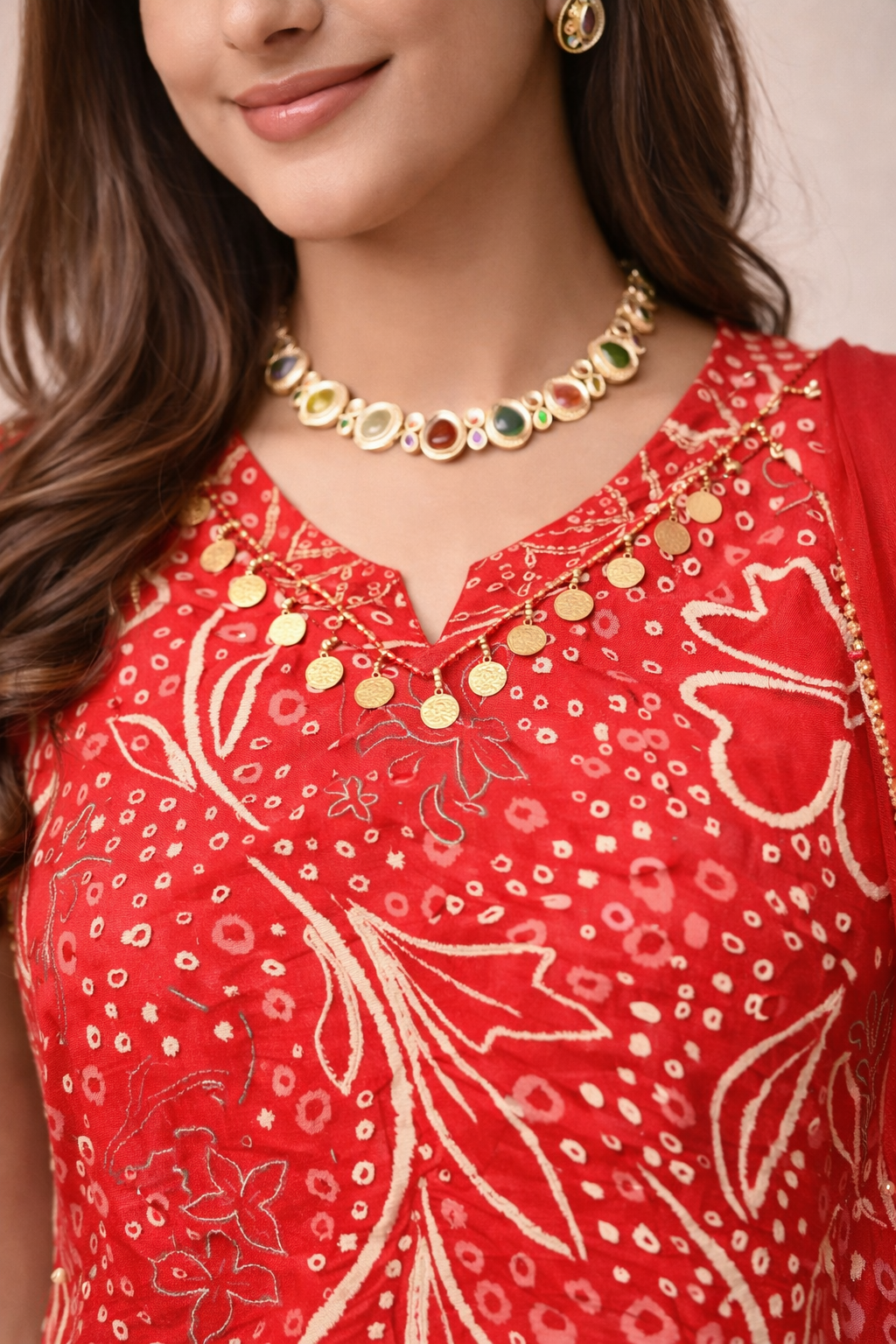 Closeup detail of ruby red embroidered dhoti suit
