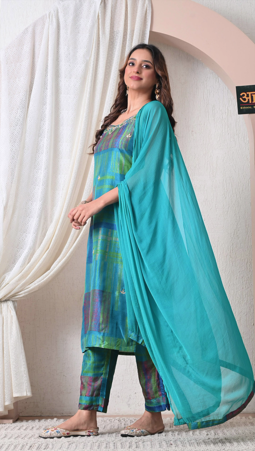 Full look of teal blue checked muslin silk kurti set